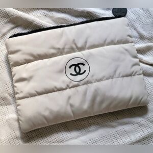 New rare and collectible puffy pouch,clutchor cosmetic bag with zipper in white